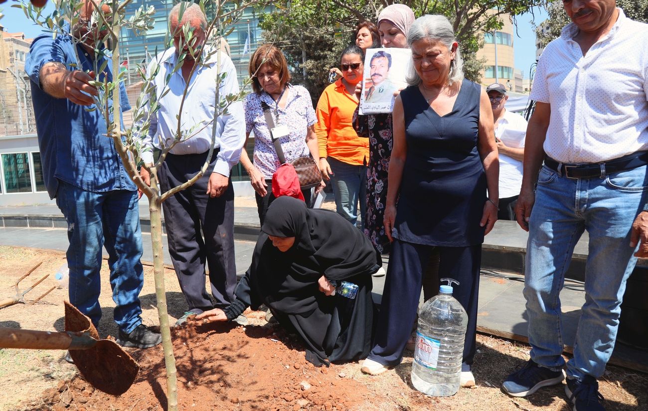 The Committee of the Families of the Kidnapped and Disappeared in Lebanon plants a tree in Gebran Khalil Gebran Garden, Beirut