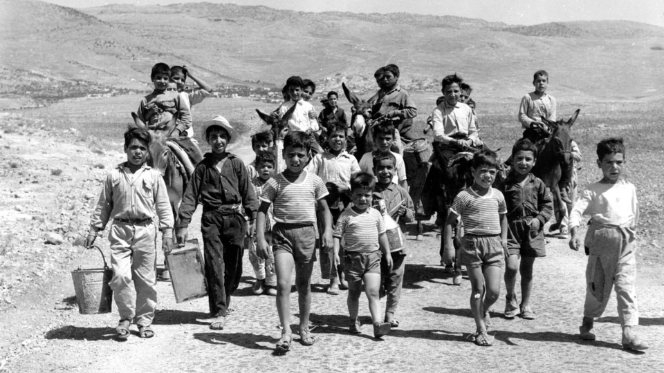 Children in Akkar on their way to fill up water from a well, July 1967. 